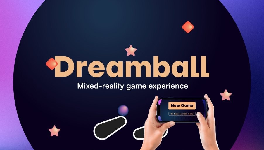 Dreamball concept poster: the title over a dark circle with pinball flippers and a ball, and two hands holding a phone that shows the game menu